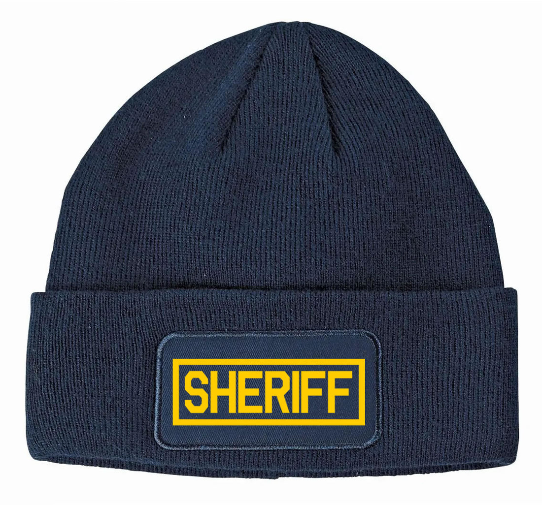 Navy blue beanie with 'SHERIFF' patch on a white background