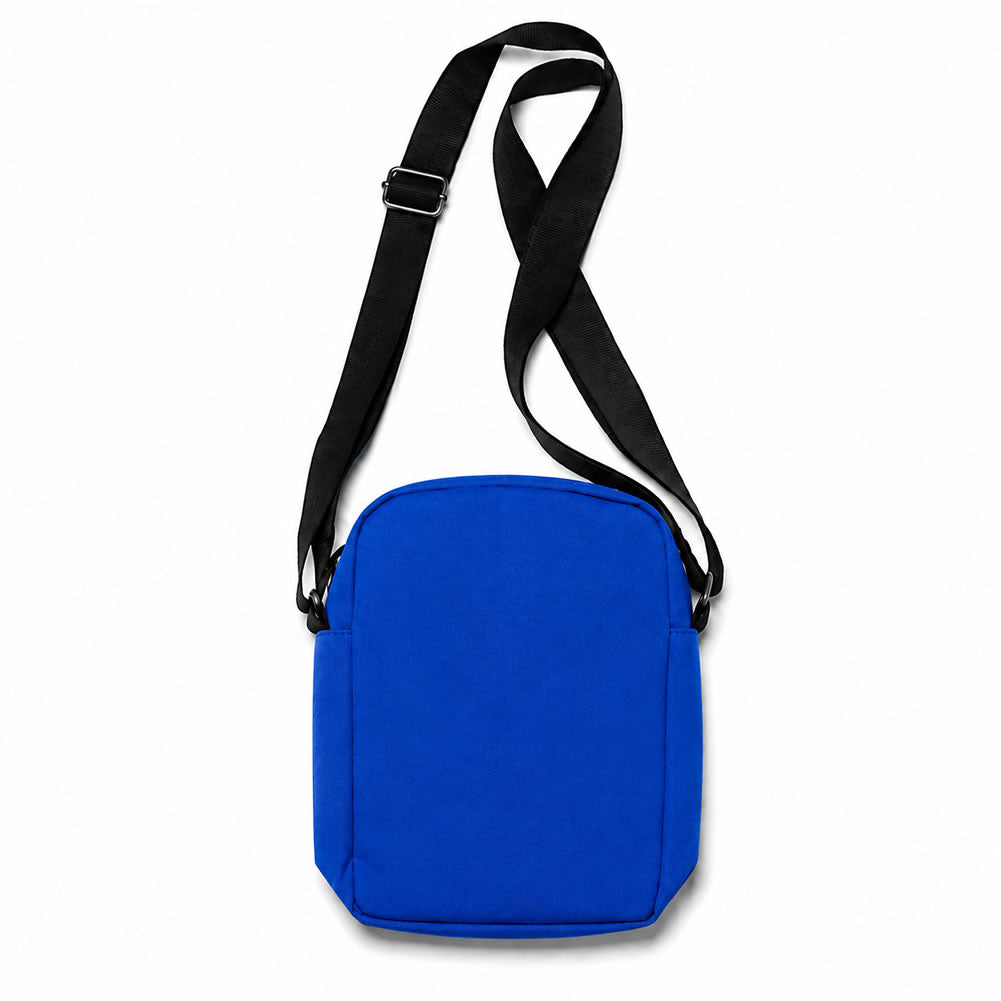 A royal blue crossbody bag with a black adjustable shoulder strap, shown against a plain white background.